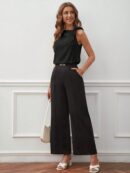 Blusa Negra Asimétrica con Nudo en Hombro y Cuello