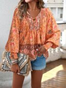 Blusa Floral con Lazada al Cuello y Mangas Farol