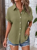 Camisa Azul Marino con Detalles Texturados y Mangas Batwing