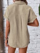 Camisa Azul Marino con Detalles Texturados y Mangas Batwing