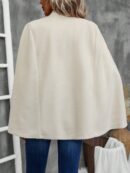 Blusa Elegante Negra con Abertura y Manga Larga