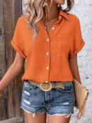 Camisa Azul Marino con Detalles Texturados y Mangas Batwing