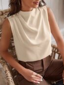 Blusa sin Mangas de Cuello Alto con Detalles Elegantes